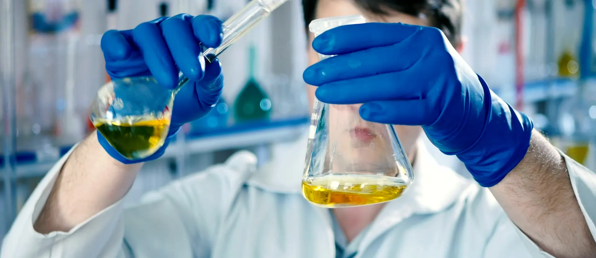 A scientist mixing formulas in a laboratory