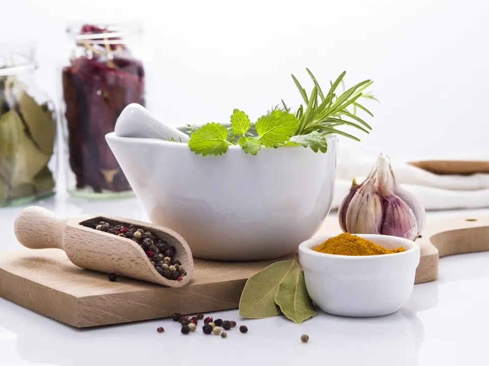 Herbs and botanicals with a mortar